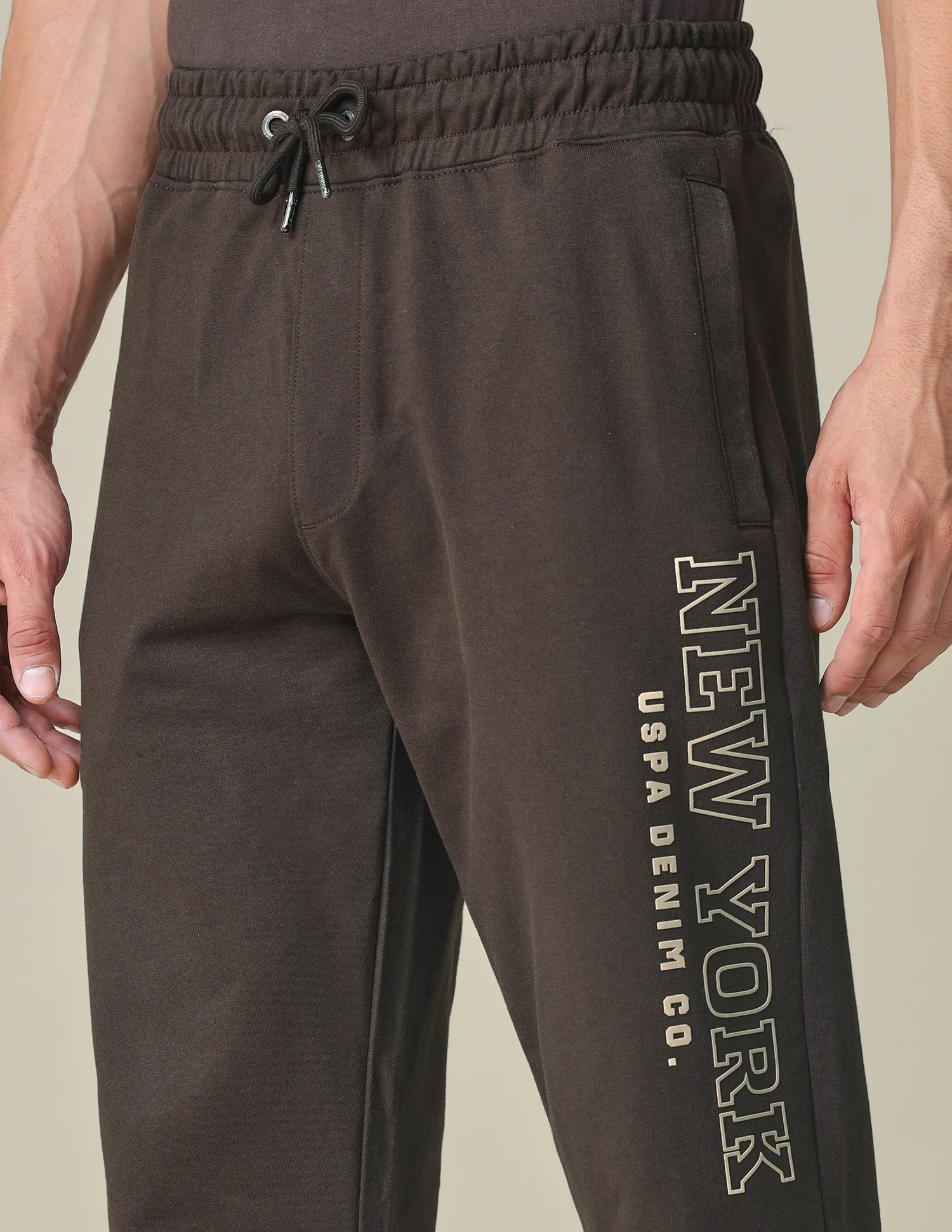 Brand Embossed Regular Fit Track Pants - Image 7